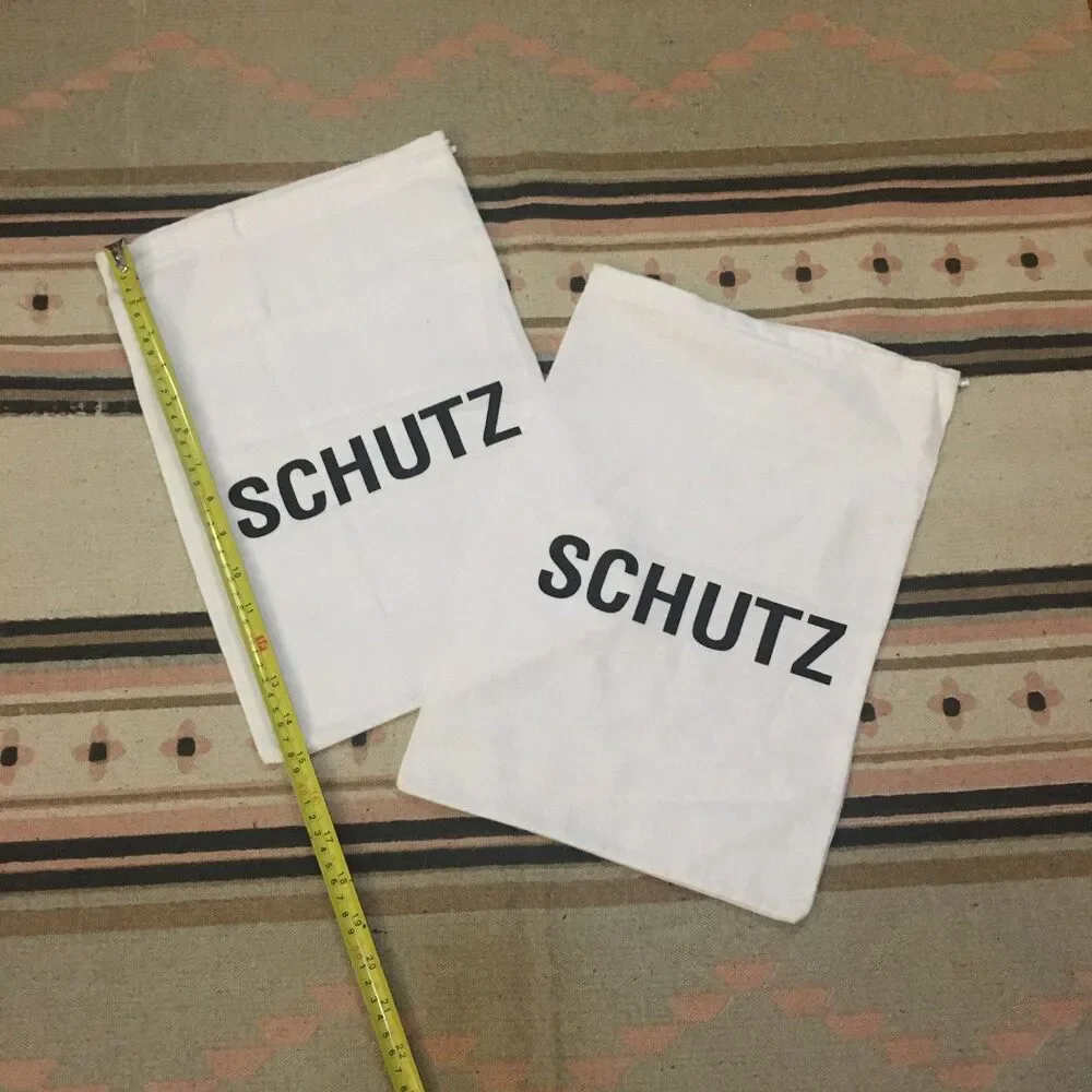 Two (2) Schutz white w/ black lettering soft material Dust bag 15” x 10” garment